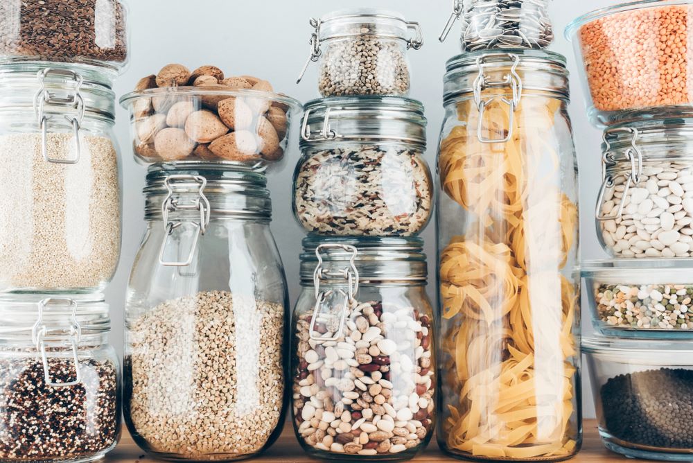 A view of assorted dry food in multiple mason jars