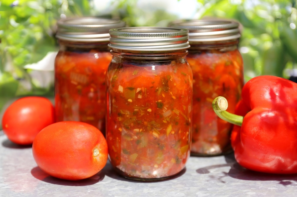 A view of salsa canned inside a jar