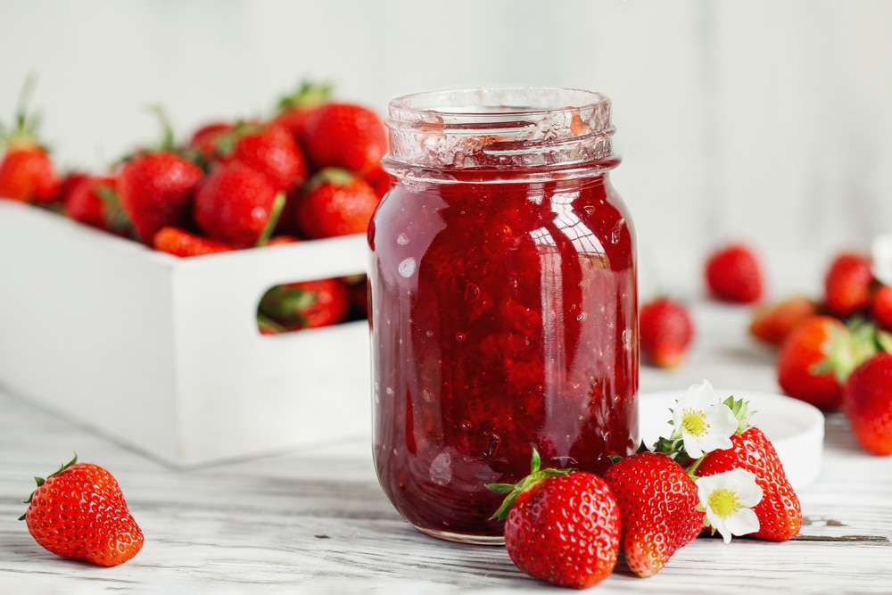 A view of strawberry jam preserved inside a can