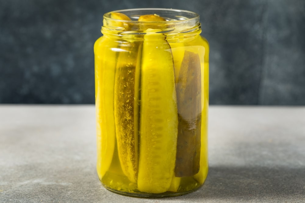 A view of sweet dill pickle inside a jar