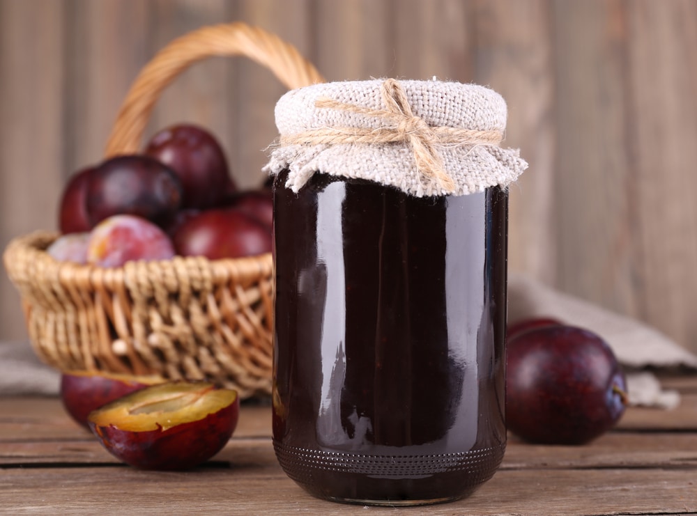 A view of plum jar inside a glass jar