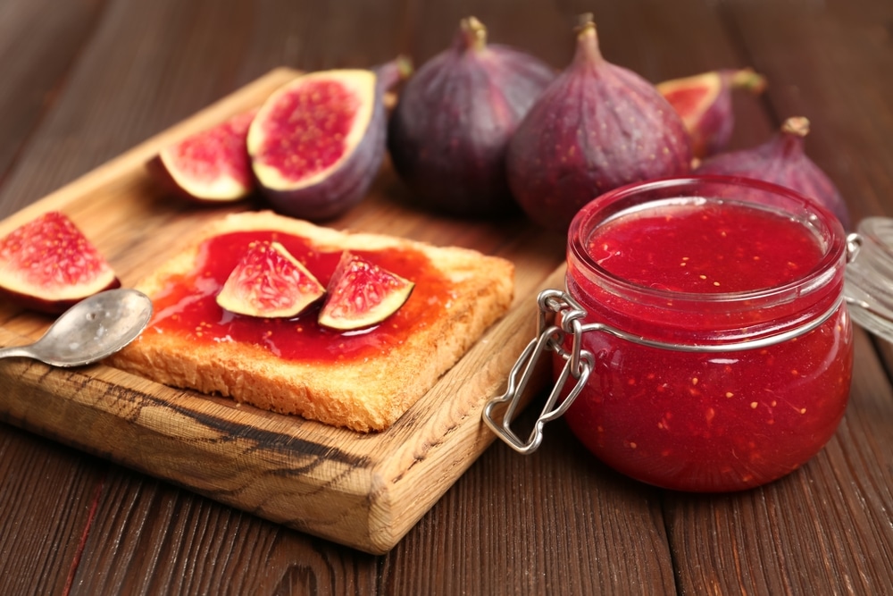 Jar Of Sweet Fig Jam And Board With Tasty Toast