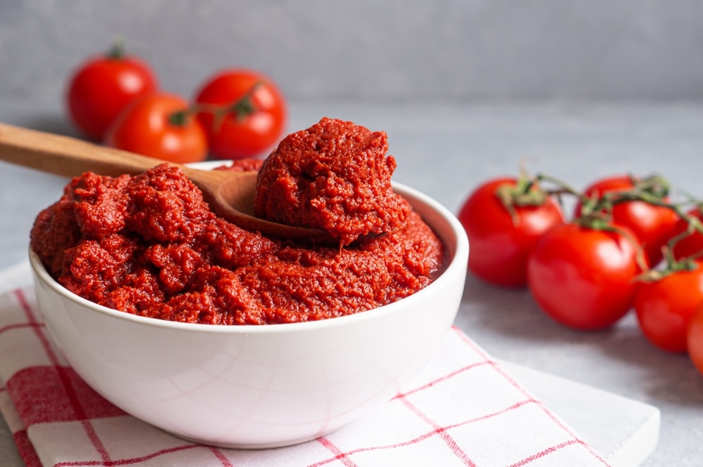 Traditional Turkish Tomato Paste In Bowl With Fresh Tomatoes 