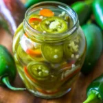 pickled jalapenos in a canning jar