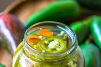 pickled jalapenos in a canning jar