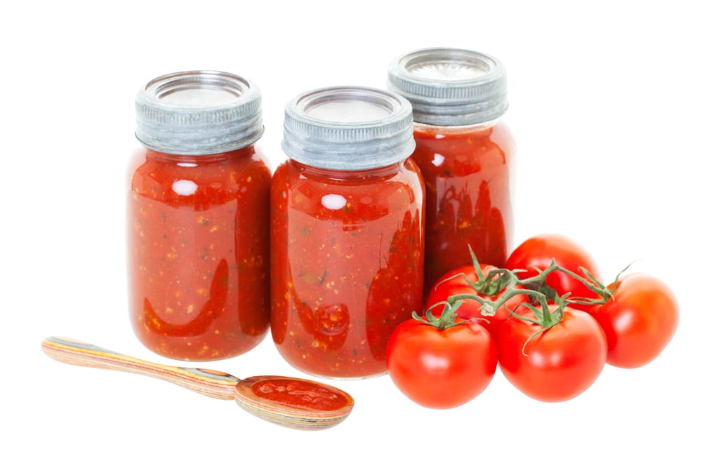 Homemade Tomato Sauce Preserved In Jars For Later Use Shot