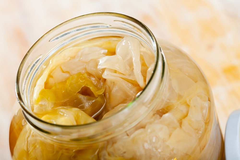 Pickled Cabbage Leaves In Brine In Glass Jar 