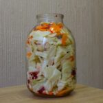 Cabbage Is Cut Into Chunks And Put In A Jar