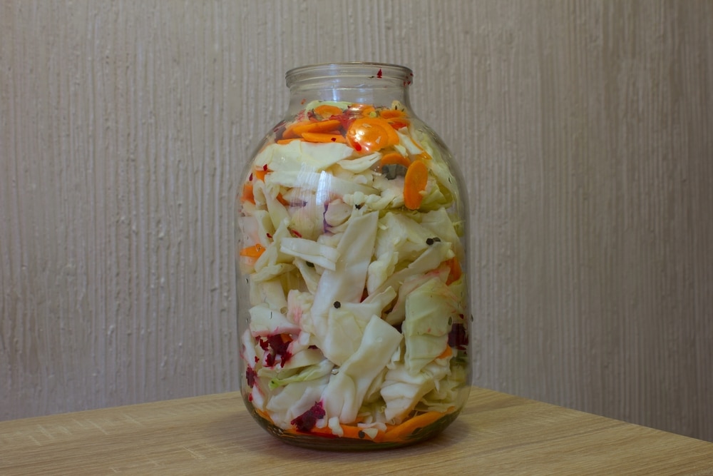 Cabbage Is Cut Into Chunks And Put In A Jar