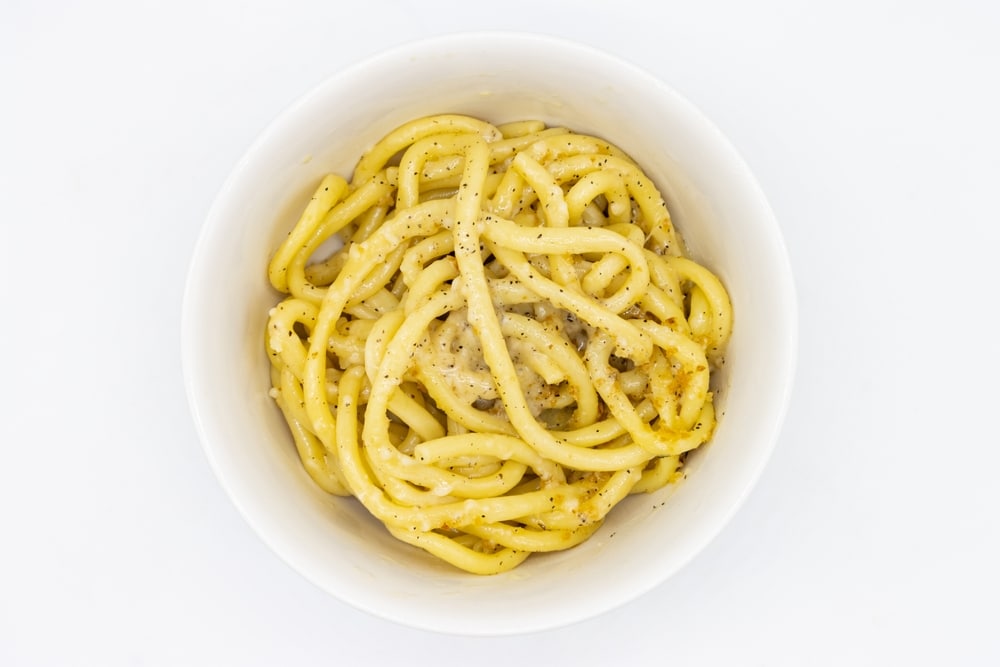 Bucatini Cacio E Pepe Pasta In A White Bowl