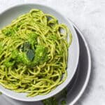 Spaghetti with homemade green tomato sauce and oregano