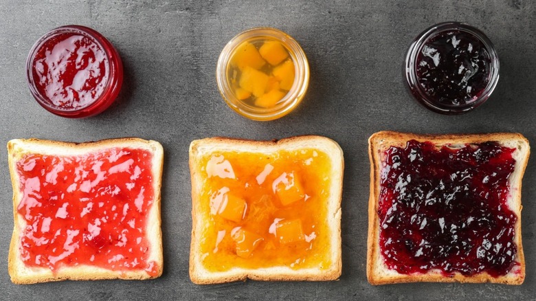 A top view of jams and spreads on bread A top view of jams and spreads on bread