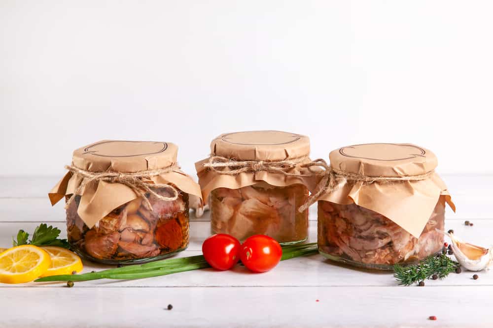 A view of meat inside cans A view of meat inside cans