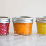 A view of three cans for baby food