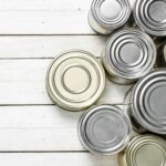 An overhead view of steel cans