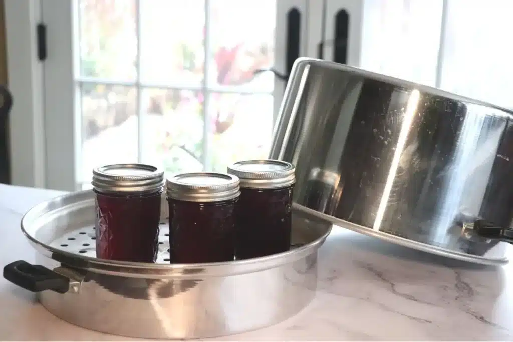 Jars being processed in a steam canner